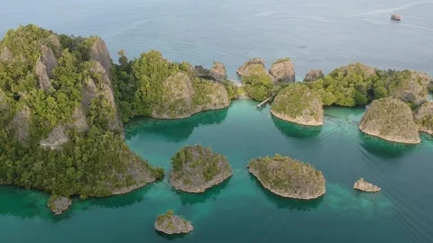 Drone, Raja Ampat viewpoint of islands and blue water Stock Footage 130315532