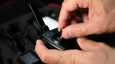 Drone Remote Control Preparation Stage, Joystick Installation Stock Footage 270183152