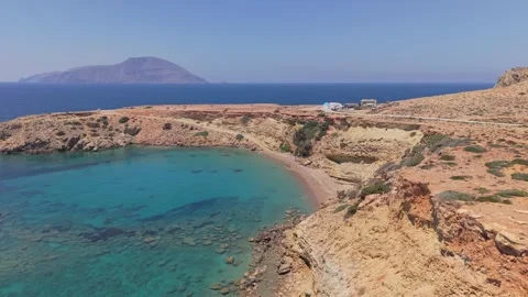 Drone Reveal of Agios Thodoros Beach, Karpathos with Clear Blue Water Stock Footage 325068149