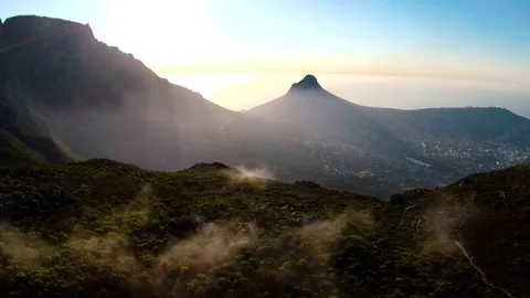 Drone reveal of Cape Town city during sunrise. Stock Footage
