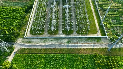 Drone Reveal of High Voltage Electrical Substation and Power Grid Infrastructure 動画素材 341596249