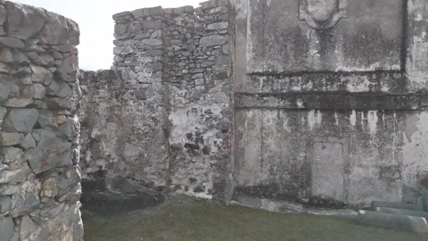 Drone Reveal Inside Cliffside Monastery Chapel with Rock Walls and Open Stock Footage 335504096
