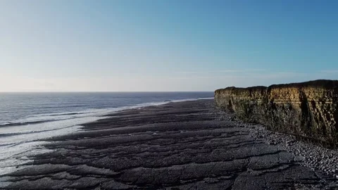 Drone Reveal Of Lighthouse From Beach Stock Footage 202591628