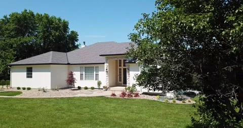 Drone Reveal of Nice House Behind Bush Stock Footage 201576481