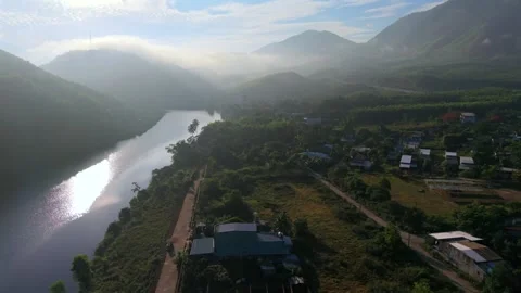 Drone Reveal Over River Mountains and Morning Mist 스톡 동영상 336857168