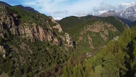 Drone Reveal Of Remote Base Camp In Mountains. Kazakhstan, Sayram-Ugam Park Stock Footage 332943516