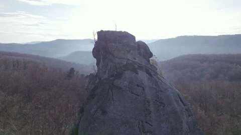 Drone Reveal From Rock Peak With Pullback Over Surrounding Cliffs Stock Footage 327206597