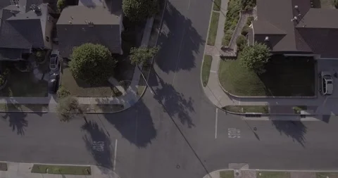 Drone Reveal Shot of A Nice Neighborhood with Cars Driving in Los Angeles Stock Footage