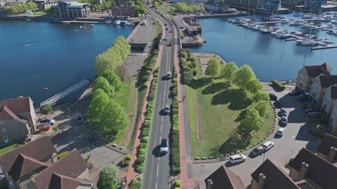 Drone Reveals Chatham Waterfront Bridge leading onto Island Homes [4K] Stock Footage 335820554