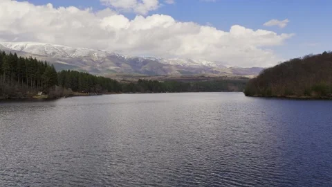 Drone Reveals Snow Mountains Over Lake Stock Footage 340270201