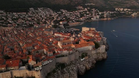 Drone Reverse Parallax Left Dubrovnik Old Town Harbor Sunset 4K 動画素材 337856318