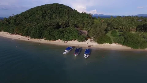 Drone reverse pull back from beach revealing ocean Stock Footage 97250292