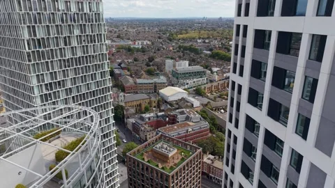 Drone reverse pullback between Stratford high-rises, Stratosphere and Stratford Stock Footage 345669383