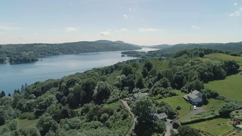 Drone Reverse reveal Lake to Trees, Lake District  Video stock 102954454