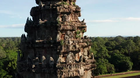 Drone rise of a spire at Angkor Wat temple Stock Footage 246771069