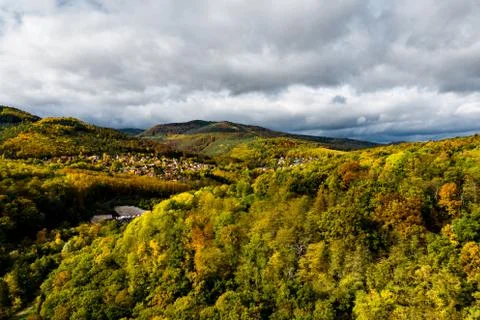 A drone rises above a multi-colored valley in the Vosges. Stock Photos