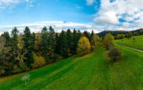 A drone rises above a multi-colored valley in the Vosges. Panoramic view. Foto stock