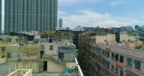 Drone rises above the old last century residential area of Hong Kong Stock Footage 108434816