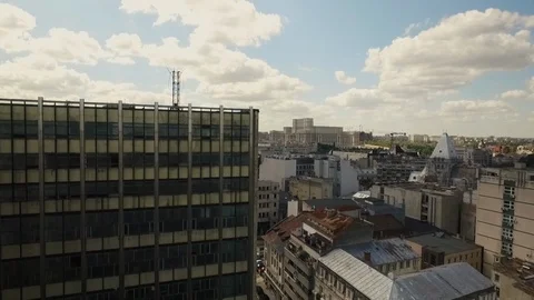 The drone rises above the urban development. Stock-Footage 107726408