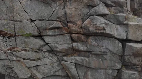 The drone rises up exploring the rock for the possibility of climbing climbers Stock Footage 163885682