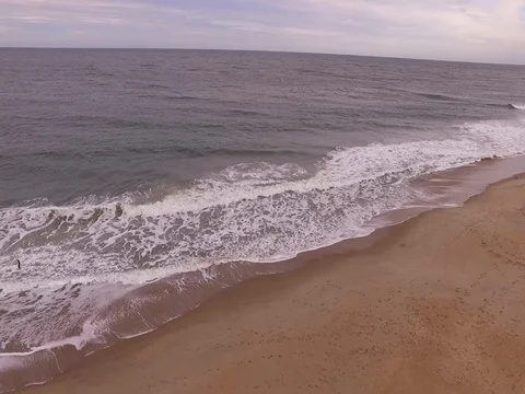 Drone rises over Beach Stock Footage 82574669