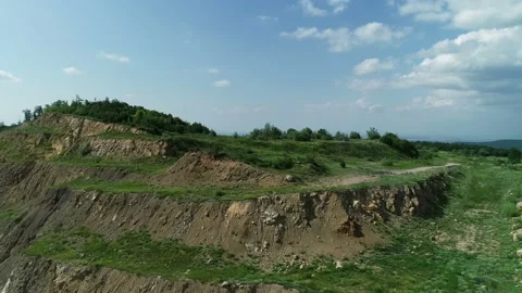 The Drone Rises Over A Hill High In The Mountains . Stock Footage 136635851
