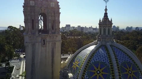 Drone rises up over the Museum of Man revealing downtown San Diego Stock Footage 71134712