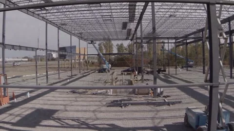Drone rising above a building in construction. Stock Footage 63882831