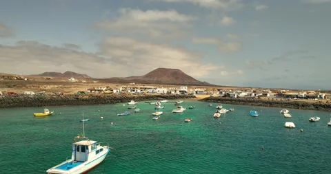 Drone rising above harbour full of small boats, 2025-05-05, El Jablito, Spain Stock Footage 343622334