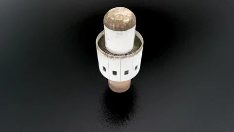 Drone rising and centering white tower in black water of water reseservoir Stock Footage 251658909