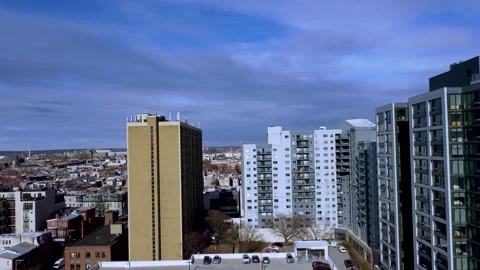 Drone Rising From Apartment Buildings to View of City Stock Footage
