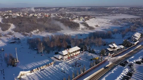 Drone rising backward over winter ski resort Stock-Footage 322641204