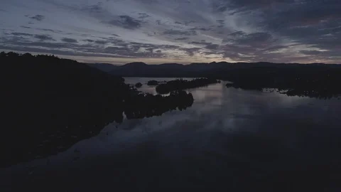 Drone Rising up facing sunrise, D-log, Lake District Video stock 90913488