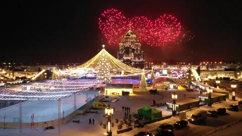 Drone rising forward over festive winter square Stock Footage 322999866
