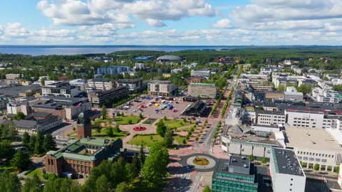 Drone rising in front of downtown Joensuu, sunny, summer day in Finland Stock Footage 341995238