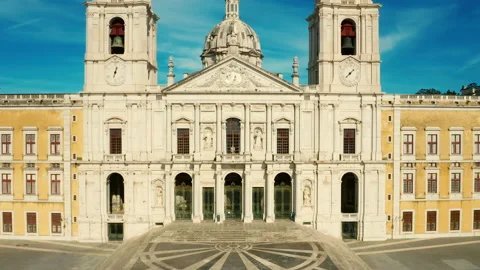 Drone is rising in front of Royal Convent and Palace of Mafra, baroque and ne Stock Footage 197298008