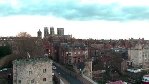 Drone rising over bridge and river to reveal huge church standing in the Stock Footage 168070155