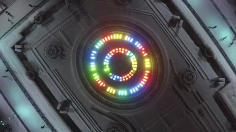 Drone rising over multicolor illuminated fountain in winter layout Video stock 322008129
