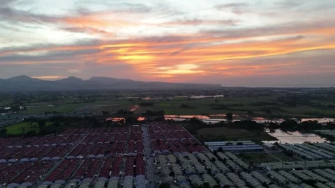 Drone rising over Naic, Cavite at golden sunset – Aerial view, Philippines Stock Footage 319848129