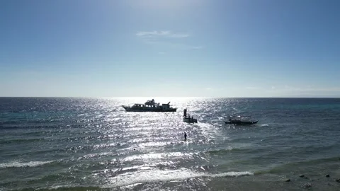 Drone Rising Shot of Small Ferry Boat with Sun Behind, Philippines Stock Footage 303280581