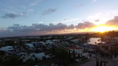 Drone rising with sunset in residential complex Stock Footage 73379295
