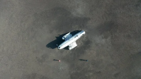 Drone rocket shot of plane crash, upwards camera movement Stock Footage 110730355