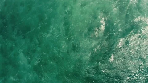 Drone rotates on 360 degree over ocean water. Close up Drone view over ocean  Stock Footage 197268337