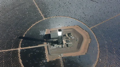 Drone rotating above huge circle of solar panels and power station in Nipton USA Stock-Footage 162048459