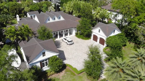Drone Rotating Around Affluent Large Suburban House Stock Footage 248623105