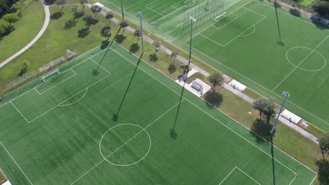 Drone rotating over artificial turf Soccer Fields in Miami. 스톡 동영상 311060302