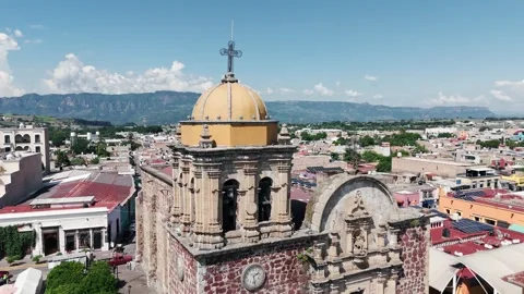 Drone Rotating over the Tower of La Purisima Temple in Tequila, Jalisco. Mex Stock Footage 285261424