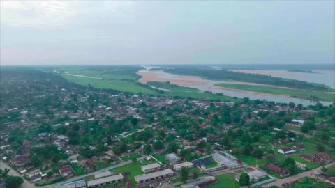 Drone rotating toward continent in Impfondo, overall view, Congo Vídeos de archivo 331999696