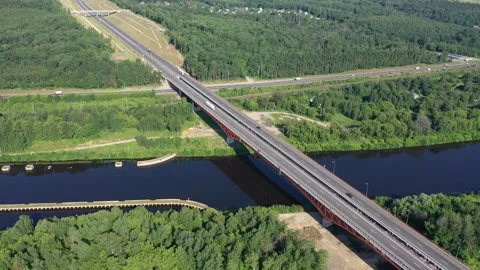 Drone rotating view of highway bridge over river Stock Footage 321642883