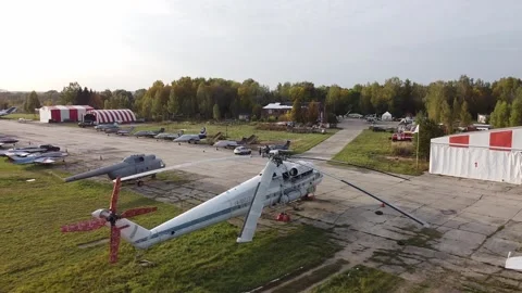 Drone rotating view over small airfield with aircraft Stockbeeldmateriaal 333625181